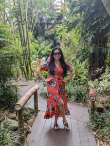 beautiful lady in summer dress at marie selby gardens sarasota florida