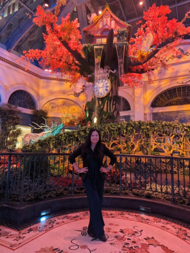 beautiful girl at bellagio conservatory & botanical gardens fall theme the garden of time